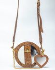 Leon Full Moon Bag In Handtooled Leather & Black And White Cowhide