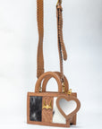 Leon Mini Handle Purse In Handtooled Leather & Black And White Cowhide